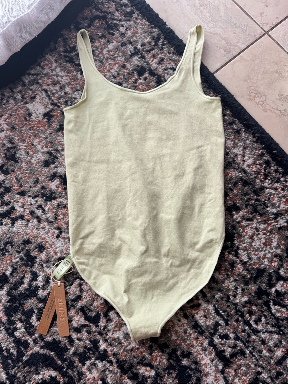 SKIMS Kids Ribbed Tank One-Piece Bodysuit in Light Sage